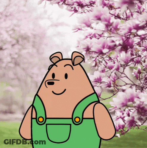A Cartoon Bear Wearing Green Overalls Is Smiling In Front Of A Tree With Purple Flowers GIF