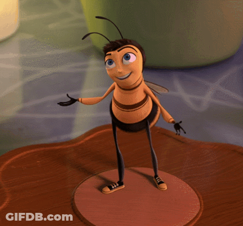 A Cartoon Bee Is Standing On A Brown Surface And Smiling GIF