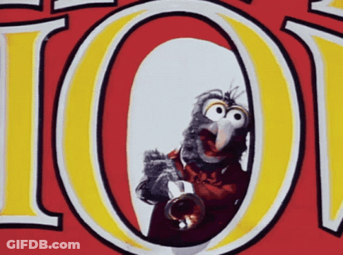 A Cartoon Bird Is Playing A Trumpet In Front Of A Red And Yellow Sign That Says 101 GIF