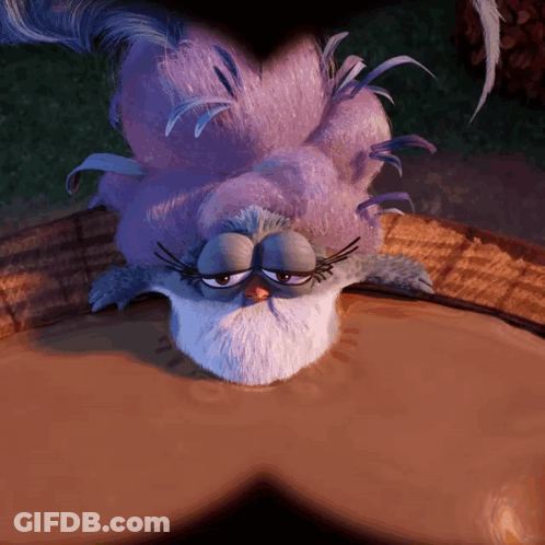 Purple Feathers Bird Lying In Mud GIF
