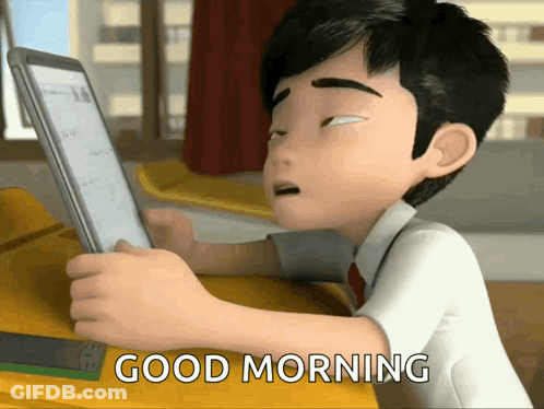 A Cartoon Boy Is Sitting At A Desk Using A Tablet And The Words Good Morning Are Above Him GIF