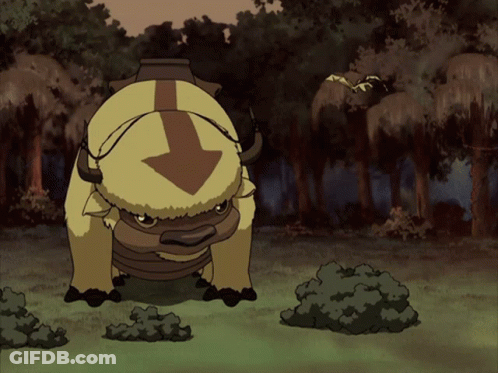 A Cartoon Buffalo With An Arrow On Its Head GIF