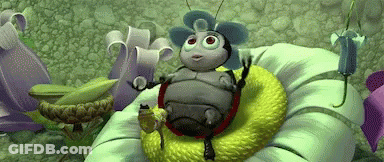 A Cartoon Bug Is Sitting On Top Of A Green Flower . GIF