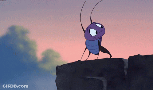 A Cartoon Bug Is Standing On A Rock With A Pink Sky Behind It GIF
