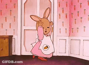 A Cartoon Bunny In A Pink Dress And Apron Is Dancing In A Room With Carrots On The Wall . GIF