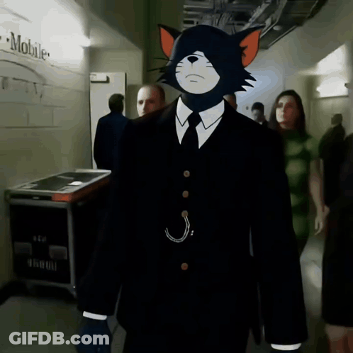 A Cartoon Cat In A Suit And Tie Is Walking In A Hallway GIF