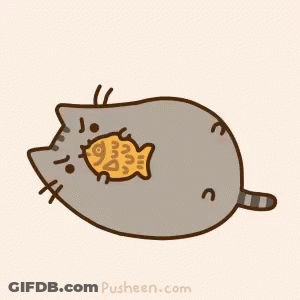A Cartoon Cat Is Eating A Fish Shaped Cookie GIF
