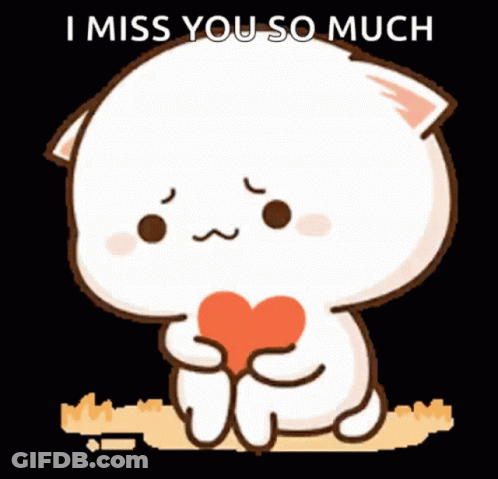 A Cartoon Cat Is Holding A Heart And Saying I Miss You So Much . GIF