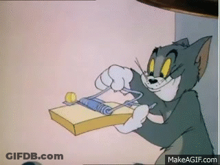 A Cartoon Cat Is Holding A Mousetrap In His Hands And Smiling . GIF