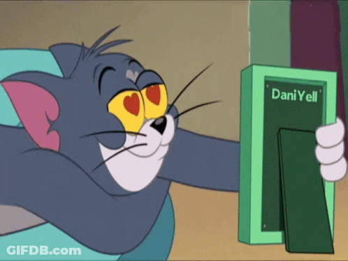 A Cartoon Cat Is Holding A Picture Frame That Says Dani Yell On It GIF