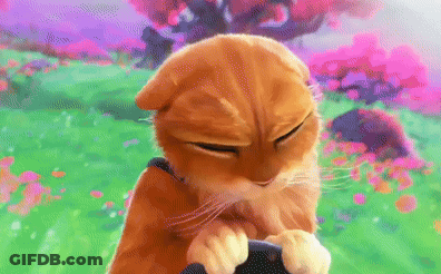 A Cartoon Cat Is Holding A Steering Wheel In A Field GIF