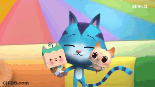 A Cartoon Cat Is Holding A Stuffed Animal And A Toy Box . GIF
