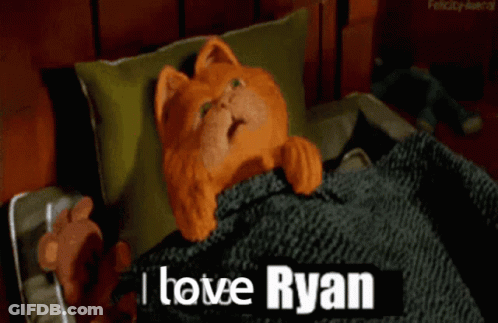 A Cartoon Cat Is Laying In Bed With The Words I Love Ryan Above It GIF