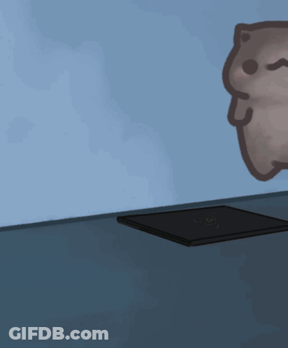 A Cartoon Cat Is Looking Over A Razer Laptop Screen GIF