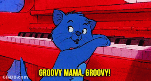 A Cartoon Cat Is Playing A Piano And Says Groovy Mama Groovy ! GIF