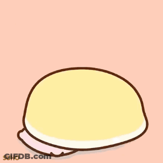 A Cartoon Cat Is Sitting On A Bed With A Pillow And Blanket . GIF