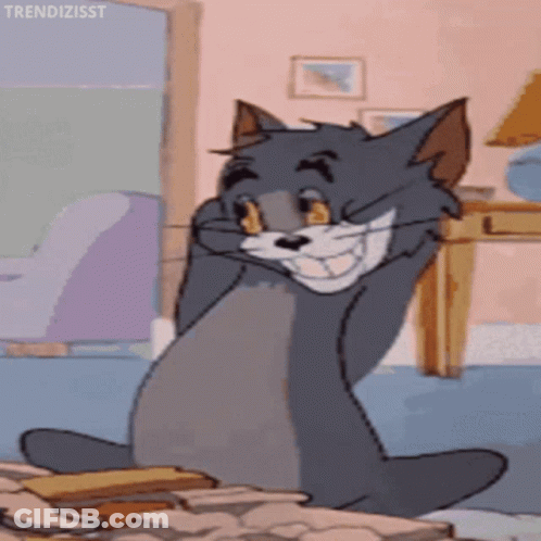 A Cartoon Cat Is Sitting On A Pile Of Papers And Making A Funny Face . GIF