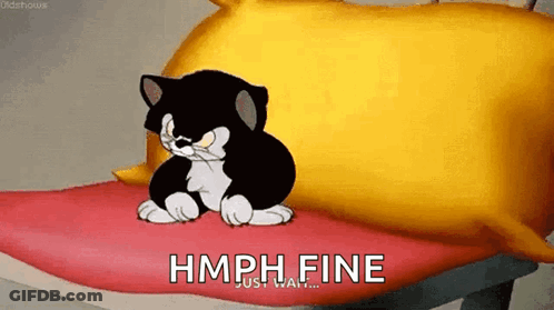 A Cartoon Cat Is Sitting On A Pillow And Says Hmph Fine Just Wait .. GIF