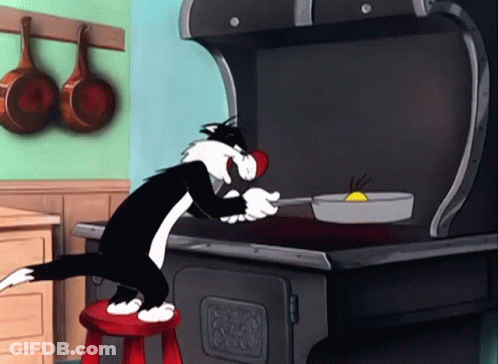 A Cartoon Cat Is Sitting On A Red Stool Cooking GIF