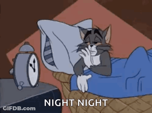A Cartoon Cat Is Sleeping In A Bed With An Alarm Clock . GIF
