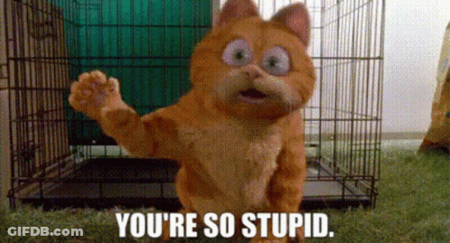 A Cartoon Cat Is Standing In Front Of A Cage With The Words `` You 'Re So Stupid '' Written Below It . GIF