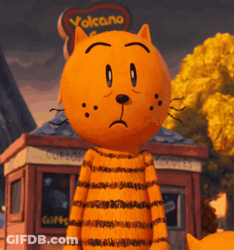 A Cartoon Cat Standing In Front Of A Volcano Sign GIF