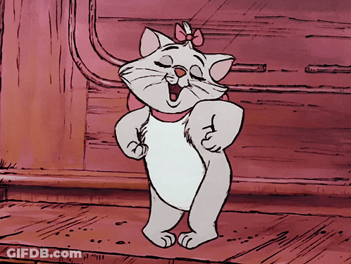 A Cartoon Cat With A Bow On Its Head Is Standing On A Wooden Floor GIF