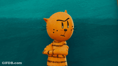 A Cartoon Cat With A Face That Says T On It GIF