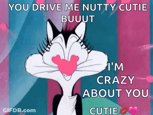 A Cartoon Cat With A Heart In Its Mouth Says " You Drive Me Nutty Cutie Buuut I 'M Crazy About You " GIF