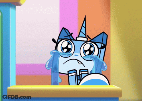 A Cartoon Cat With A Horn Is Crying With Tears Coming Out Of Its Eyes GIF