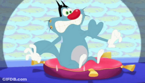 A Cartoon Cat With A Red Nose Is Sitting On A Cushion GIF