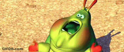 A Cartoon Caterpillar Is Sitting On The Ground With Its Mouth Open And Screaming . GIF