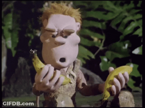 A Cartoon Character Eating A Banana With A Surprised Expression On His Face GIF