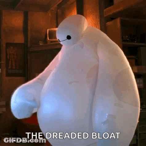 A Cartoon Character From Big Hero 6 Is Standing In A Room With The Words The Dreaded Bloat Below Him . GIF