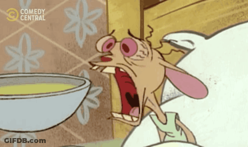 A Cartoon Character From Comedy Central Is Yawning In Front Of A Bowl Of Food GIF