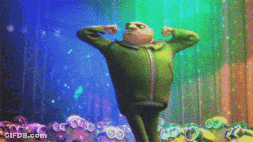 A Cartoon Character From Despicable Me Is Flexing His Muscles On A Stage . GIF