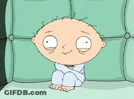 A Cartoon Character From Family Guy Is Sitting On A Couch In A Straitjacket . GIF