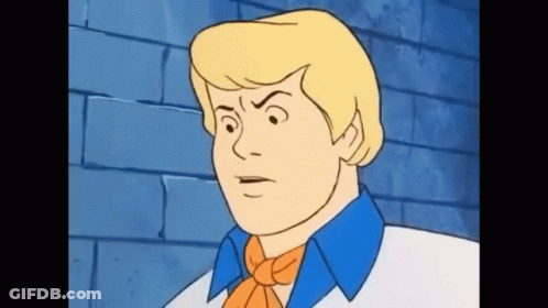 A Cartoon Character From Scooby Doo Is Making A Funny Face . GIF
