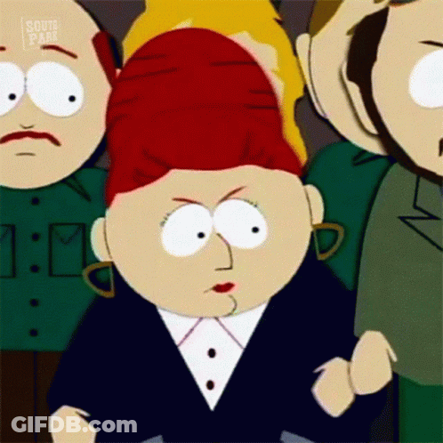 A Cartoon Character From South Park Is Standing In A Crowd Of People And Making A Funny Face . GIF