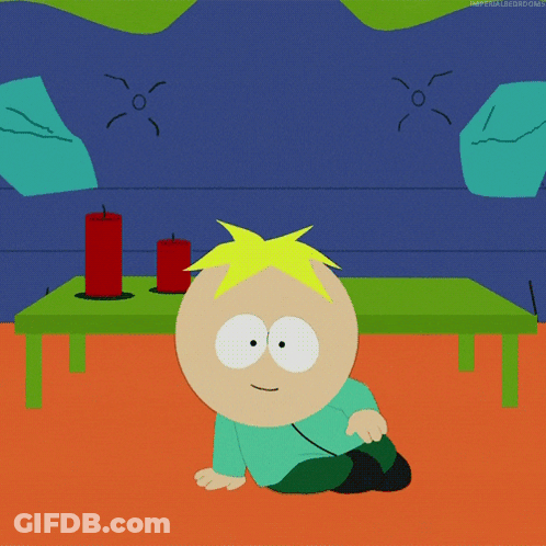 A Cartoon Character From South Park Sits On The Floor In Front Of A Table GIF