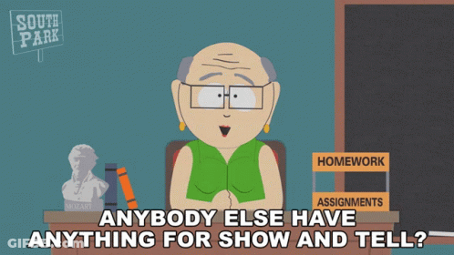 A Cartoon Character From South Park Sitting At A Desk GIF