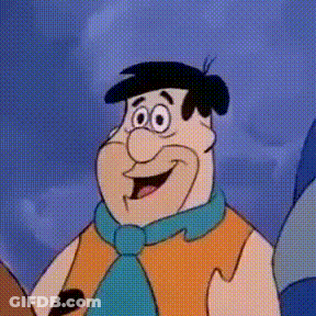 A Cartoon Character From The Flintstones Is Smiling And Wearing A Blue Scarf . GIF