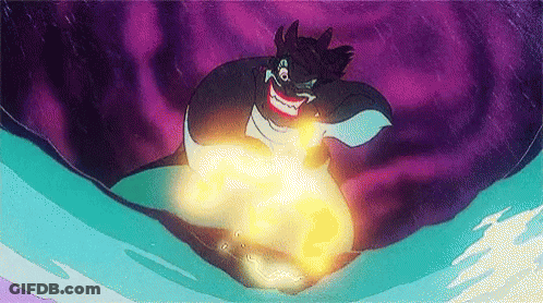 A Cartoon Character From The Little Mermaid Is Holding A Glowing Object In Her Hands . GIF