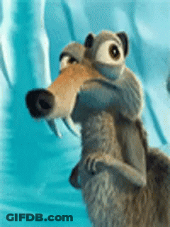 A Cartoon Character From The Movie Ice Age Is Holding A Stuffed Animal On Its Back . GIF