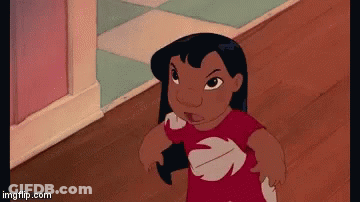 A Cartoon Character From The Movie Lilo And Stitch Is Standing In A Hallway . GIF