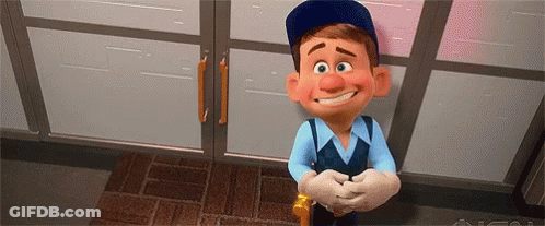 A Cartoon Character From The Movie Wreck It Ralph Is Smiling And Standing In Front Of A Door . GIF