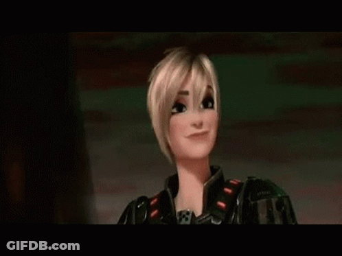 A Cartoon Character From The Movie Wreck It Ralph Is Smiling In Front Of A Rainbow Background . GIF