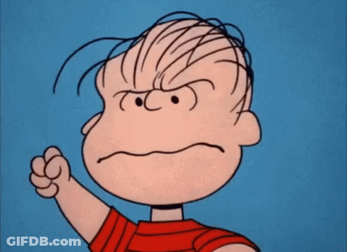 A Cartoon Character From The Peanuts Movie Is Making A Very Angry Face With His Fists In The Air . GIF