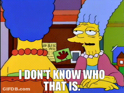 A Cartoon Character From The Simpsons Is Sitting Next To Another Cartoon Character . GIF