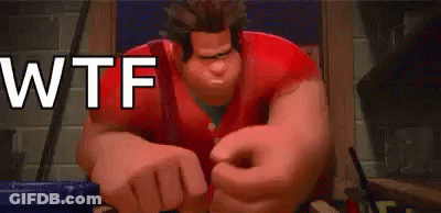 A Cartoon Character From Wreck It Ralph Is Sitting At A Table With His Hands Outstretched . GIF